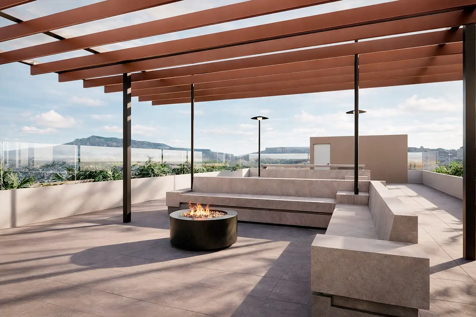 Terraza mirador al aire libre con pérgola, asientos integrados y fogata (firepit), perfecta para las zonas comunes de una vivienda nueva.